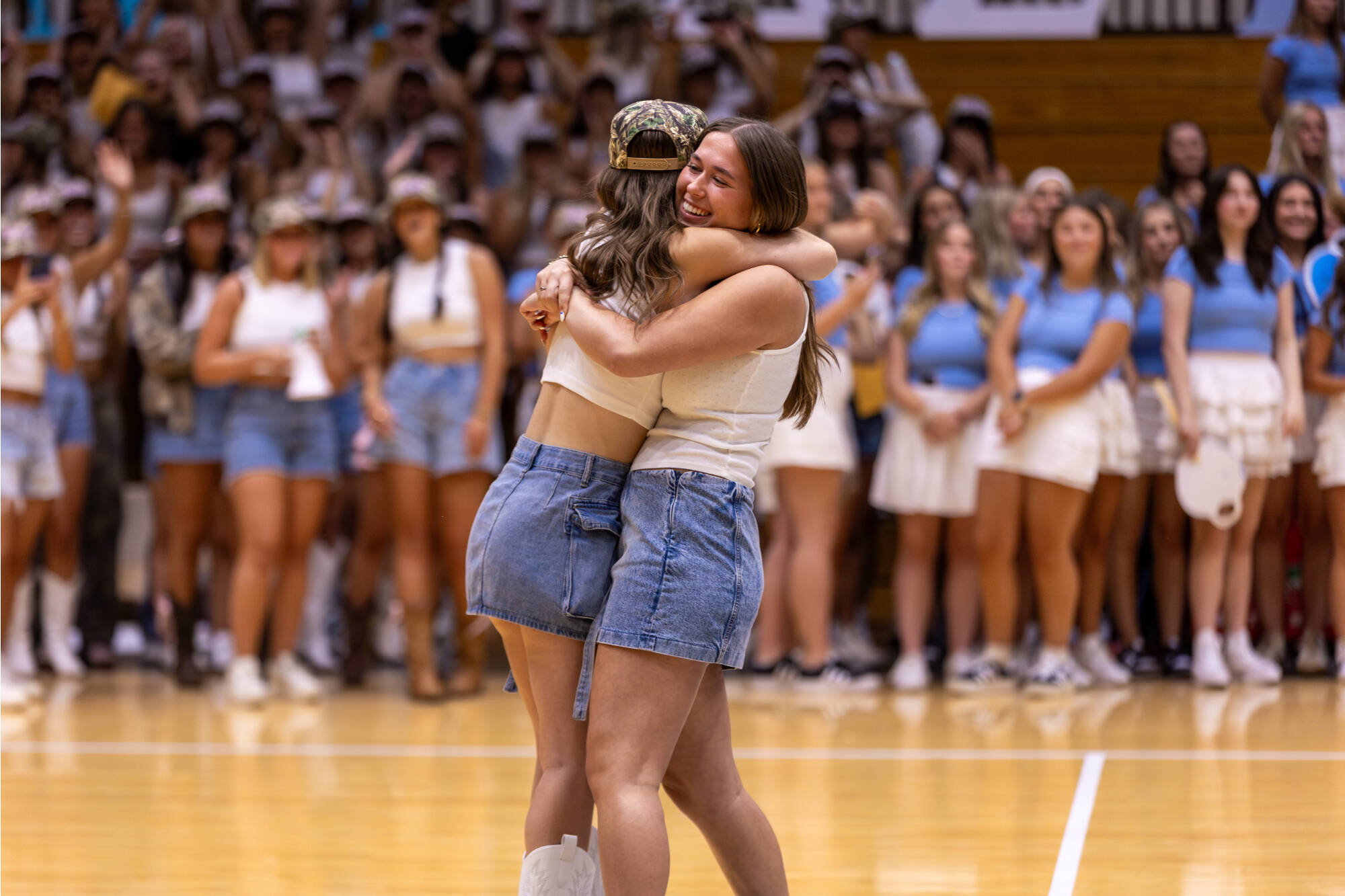 Two students hugging at Panhellenic Bid Day